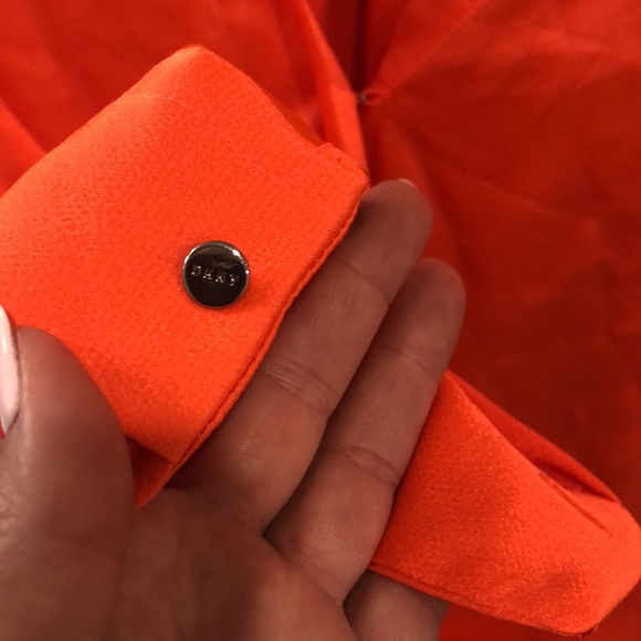 Neon orange DKNY satin low cut blouse with button sleeves. Hi low cut, - Picture 3 of 5
